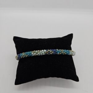blue and gold beaded woven bracelet
